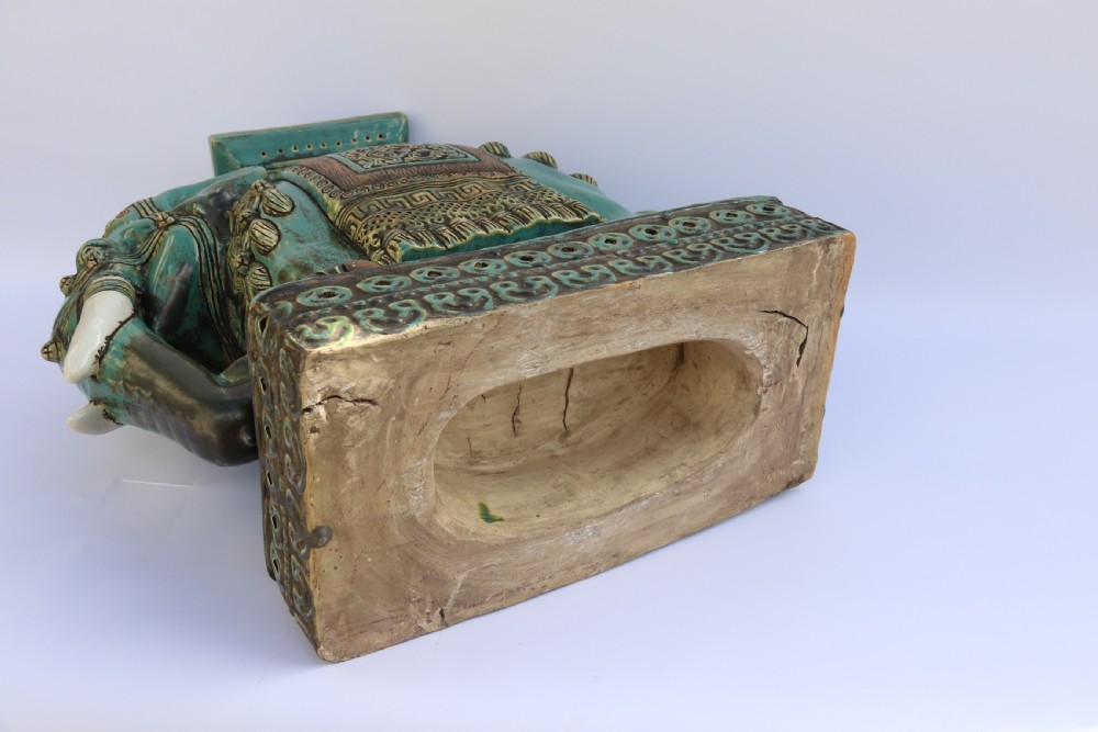 A large Chinese turquoise green pottery elephant display pedestal/stand. View IX