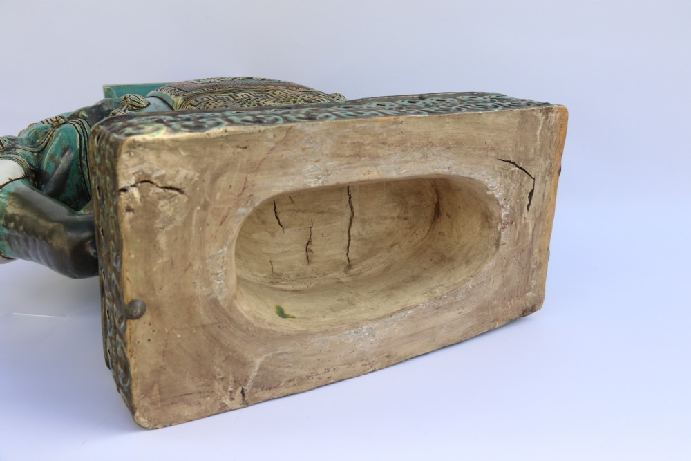 A large Chinese turquoise green pottery elephant display pedestal/stand. View X