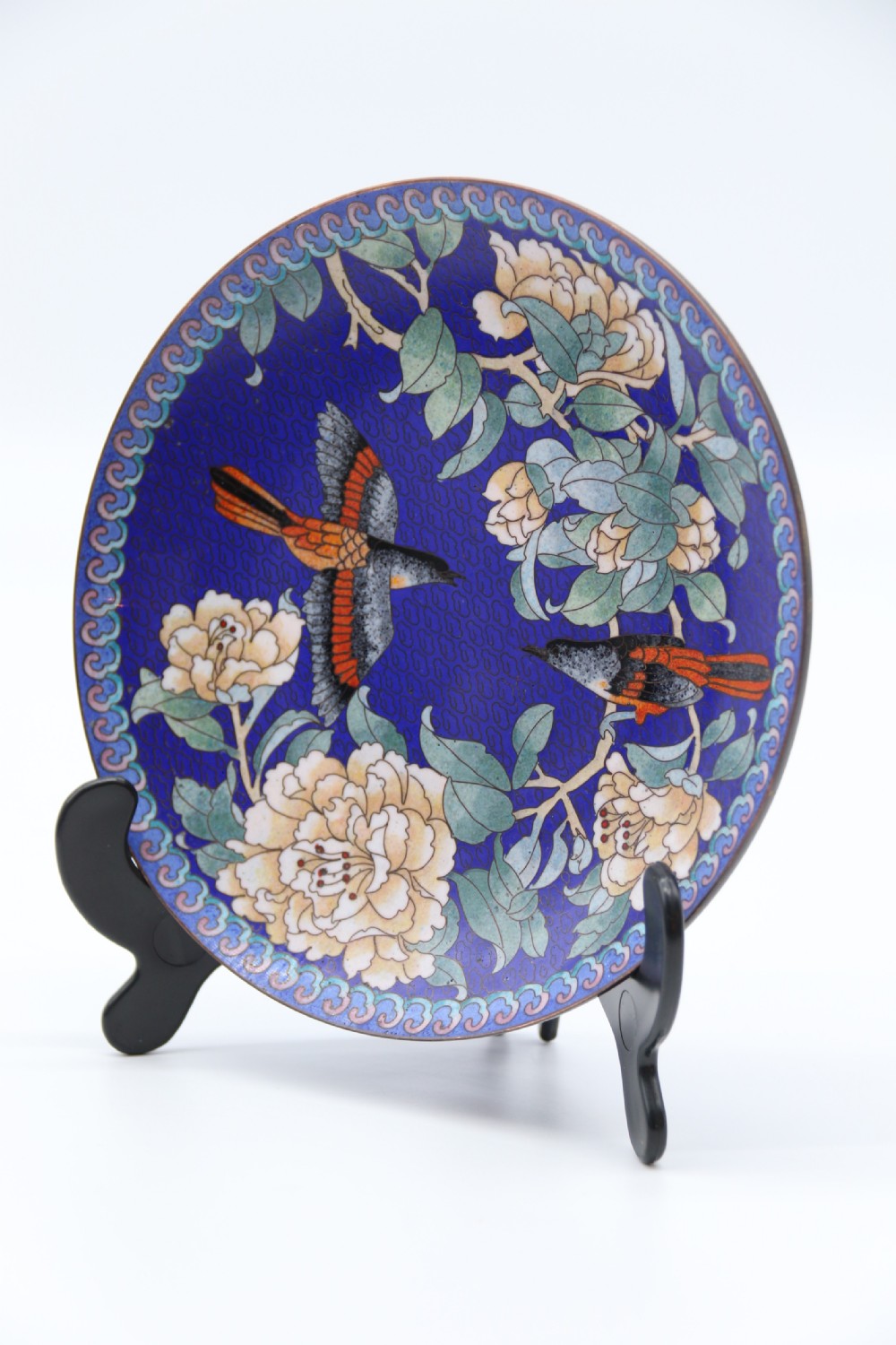A set of four Chinese cloisonne cabinet plates with exotic birds and blossom.

 View V
