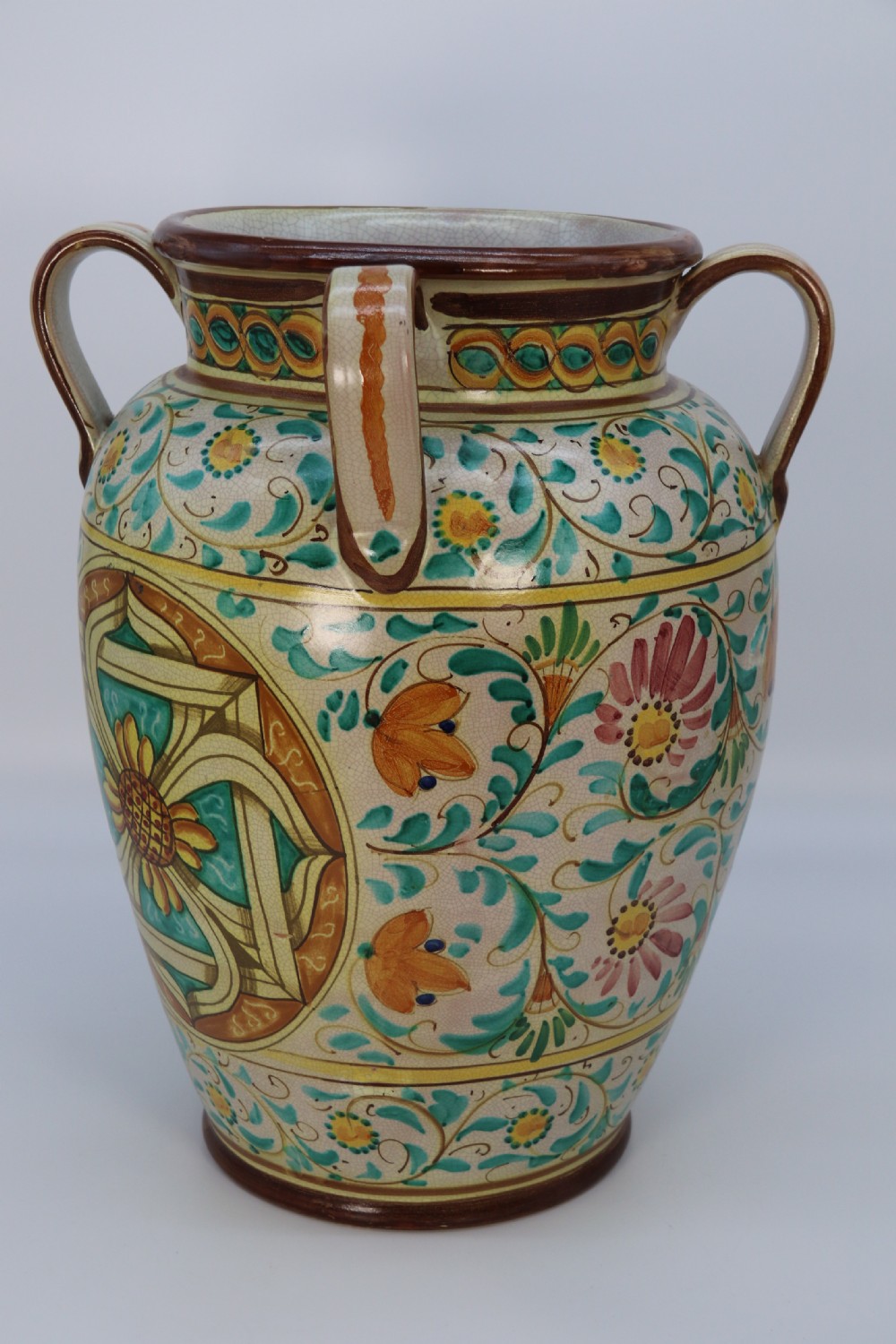 A large Italian hand thrown and painted majolica pottery vase, circa 1930

 View V