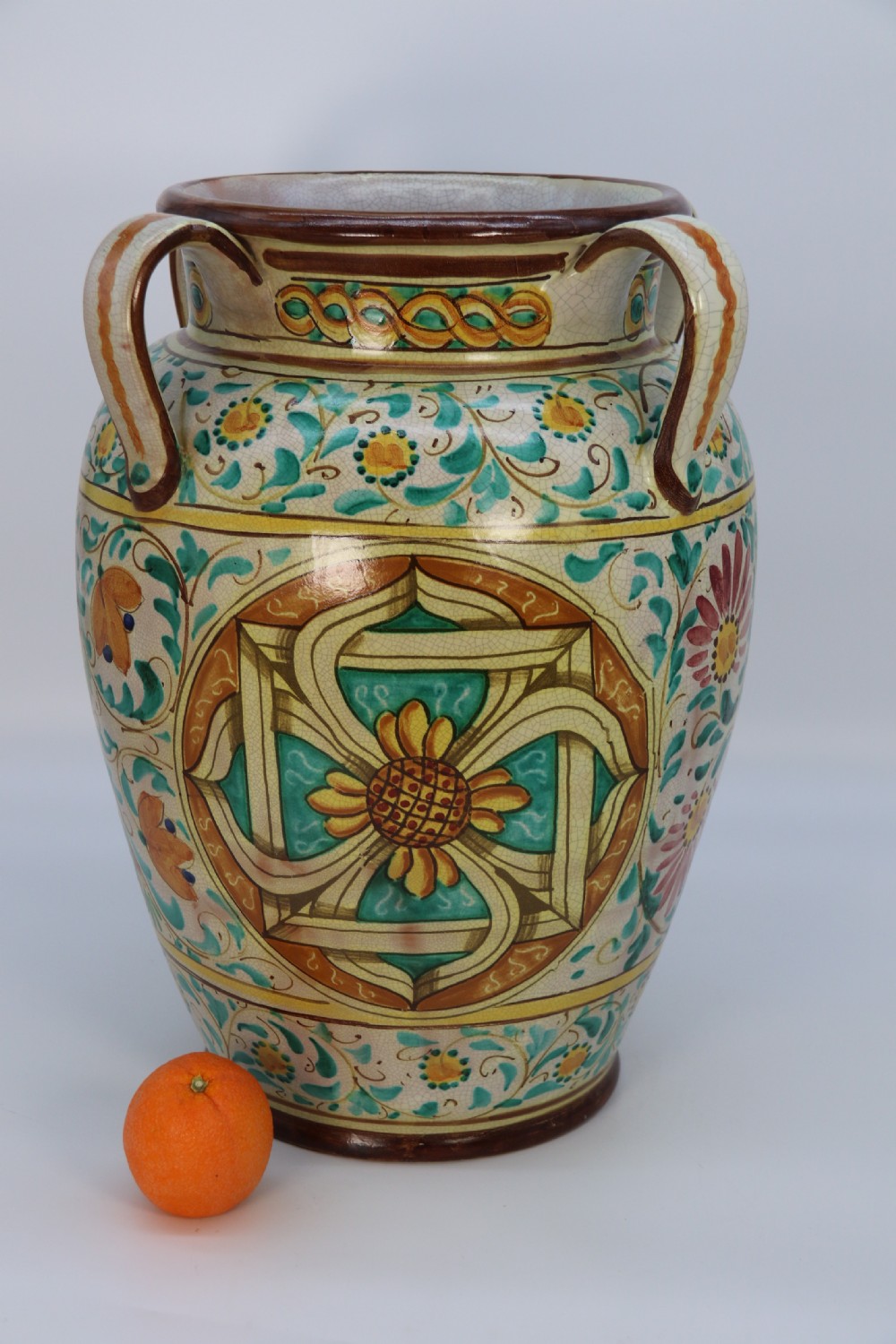 A large Italian hand thrown and painted majolica pottery vase, circa 1930

 View VI
