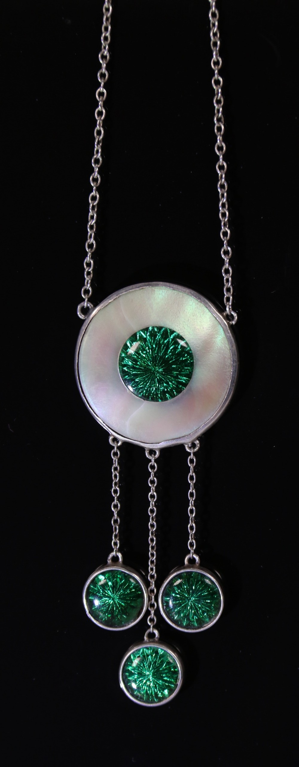 An Art Deco silver mother of pearl green enamel necklace circa 1920