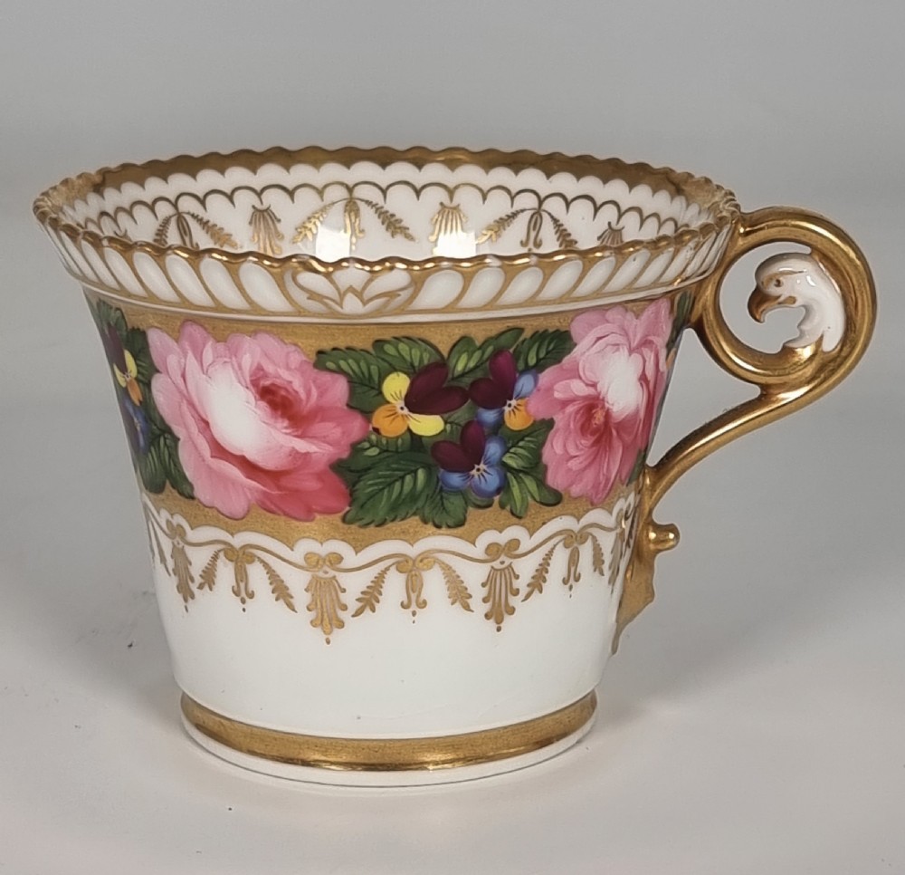 A rare Chamberlains Worcester cabinet cup and saucer hand painted with roses and pansies, circa 1816

 View III