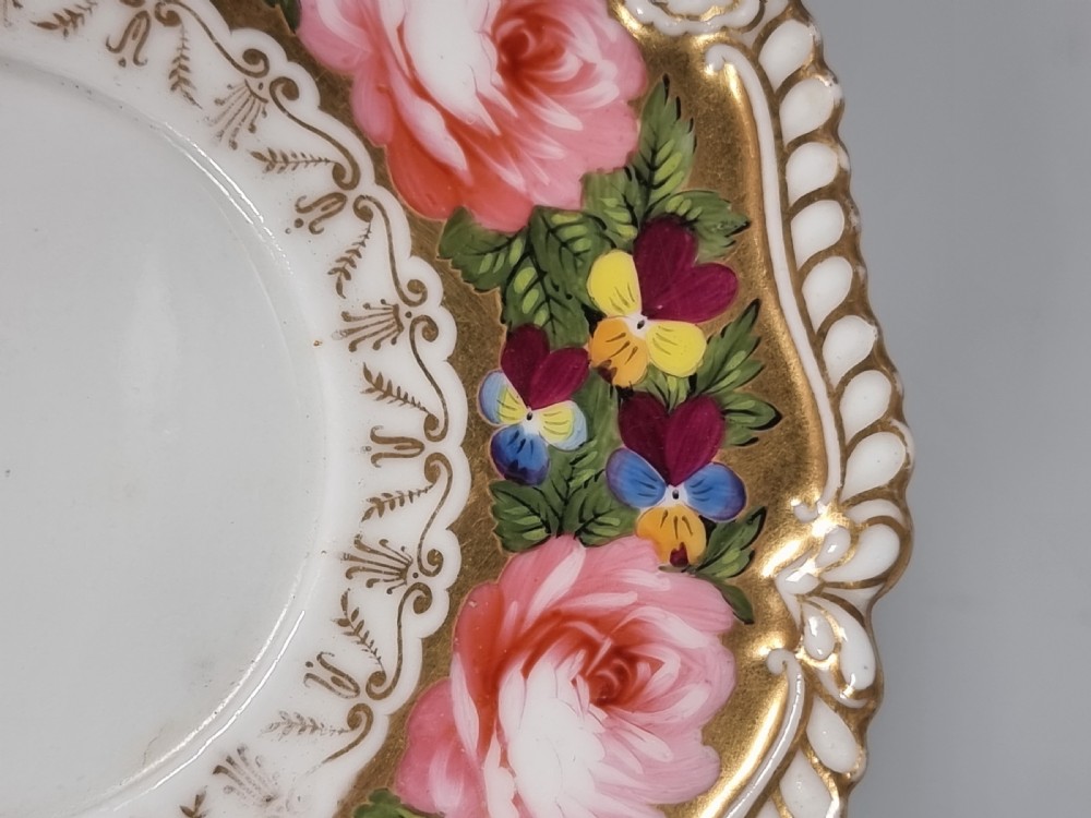 A rare Chamberlains Worcester cabinet cup and saucer hand painted with roses and pansies, circa 1816

 View IV