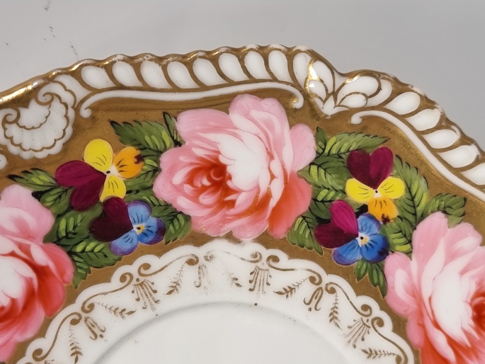 A rare Chamberlains Worcester cabinet cup and saucer hand painted with roses and pansies, circa 1816

 View V
