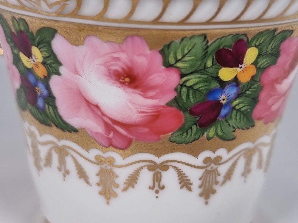 A rare Chamberlains Worcester cabinet cup and saucer hand painted with roses and pansies, circa 1816

 View XVII