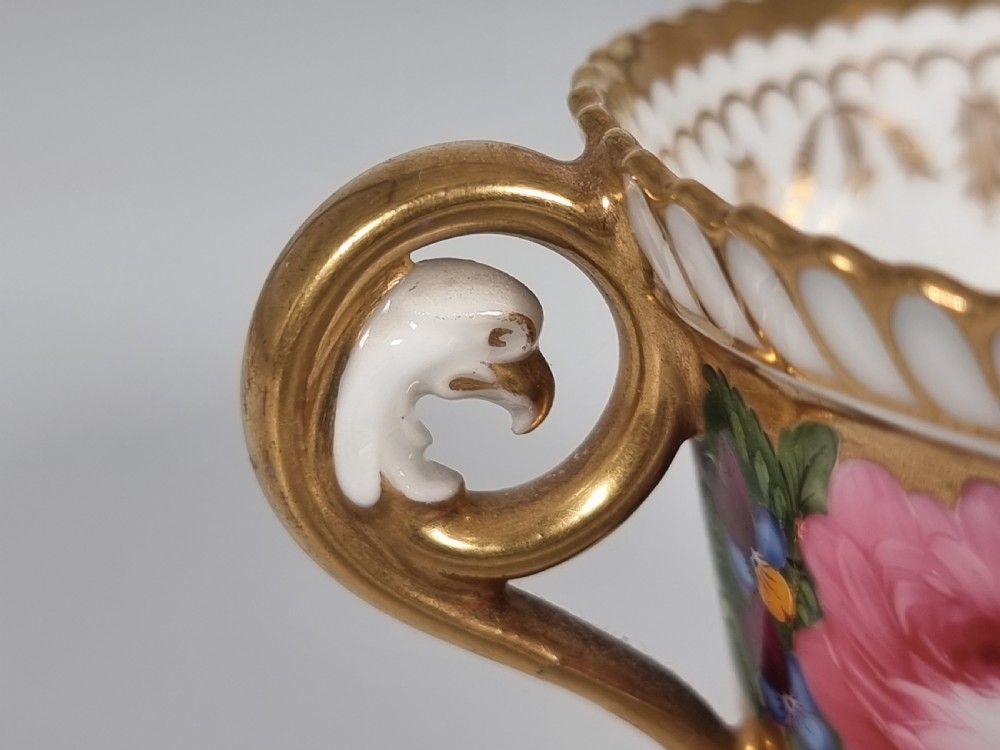 A rare Chamberlains Worcester cabinet cup and saucer hand painted with roses and pansies, circa 1816

 View XVIII