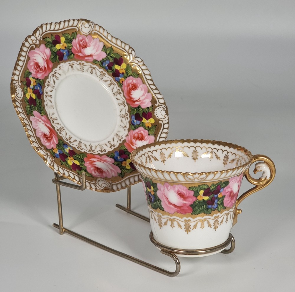 A rare Chamberlains Worcester cabinet cup and saucer hand painted with roses and pansies, circa 1816

 View XX