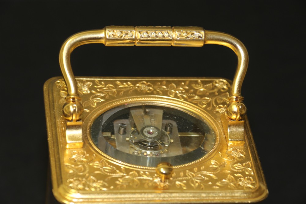 A 19th century French hand engraved and gilt cased repeating carriage Clock by Francois Arsene Margaine View XIV