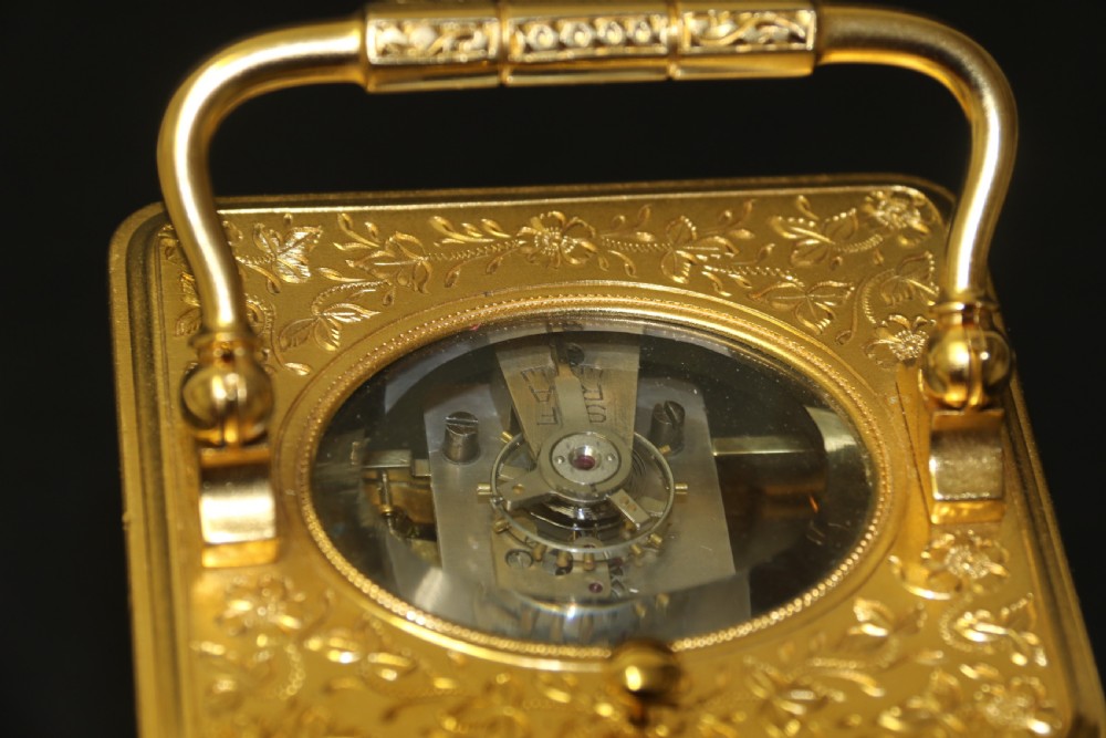 A 19th century French hand engraved and gilt cased repeating carriage Clock by Francois Arsene Margaine View XV