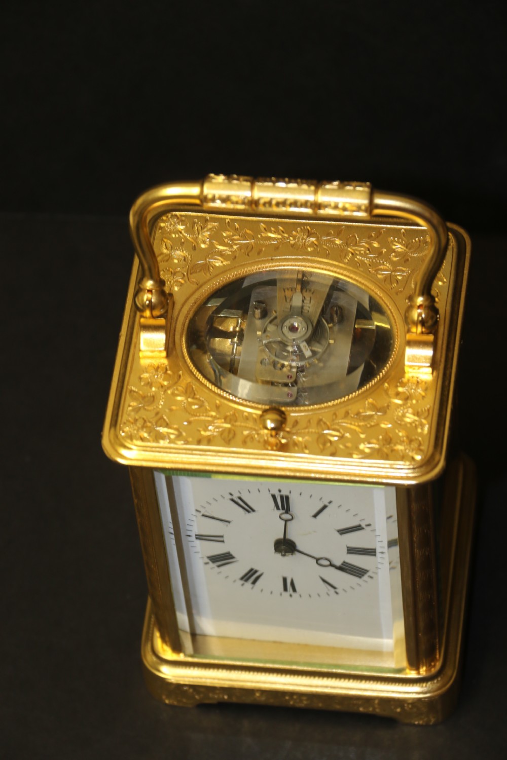 A 19th century French hand engraved and gilt cased repeating carriage Clock by Francois Arsene Margaine View XVI