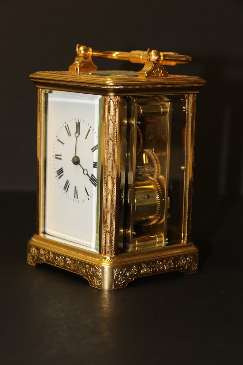 A 19th century French hand engraved and gilt cased repeating carriage Clock by Francois Arsene Margaine View XIX