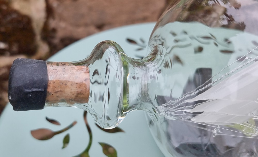 An exceptionally large hand blown glass model ship in a bottle. View VI
