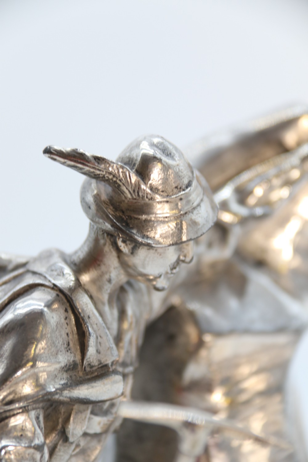 A  WMF cast metal and silver plated sculpture of an early 20th century mountaineer climbing a rock face, c 1910


 View XXIII