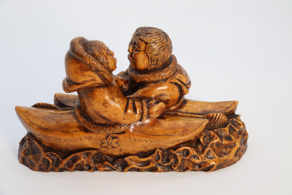 A rare early 20th century Canadian folk art maple wood carved Inuit figure group View XIII