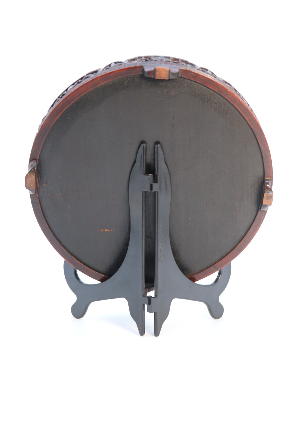 A circular carved dark hardwood tray containing an inset 19th-century Chinese silk embroidery with figural and botanical motifs. View II