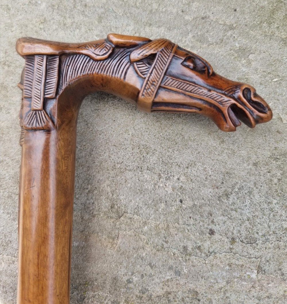 A 19th C antique Grand Tour walking stick with an equestrian racehorse carved handle. View III