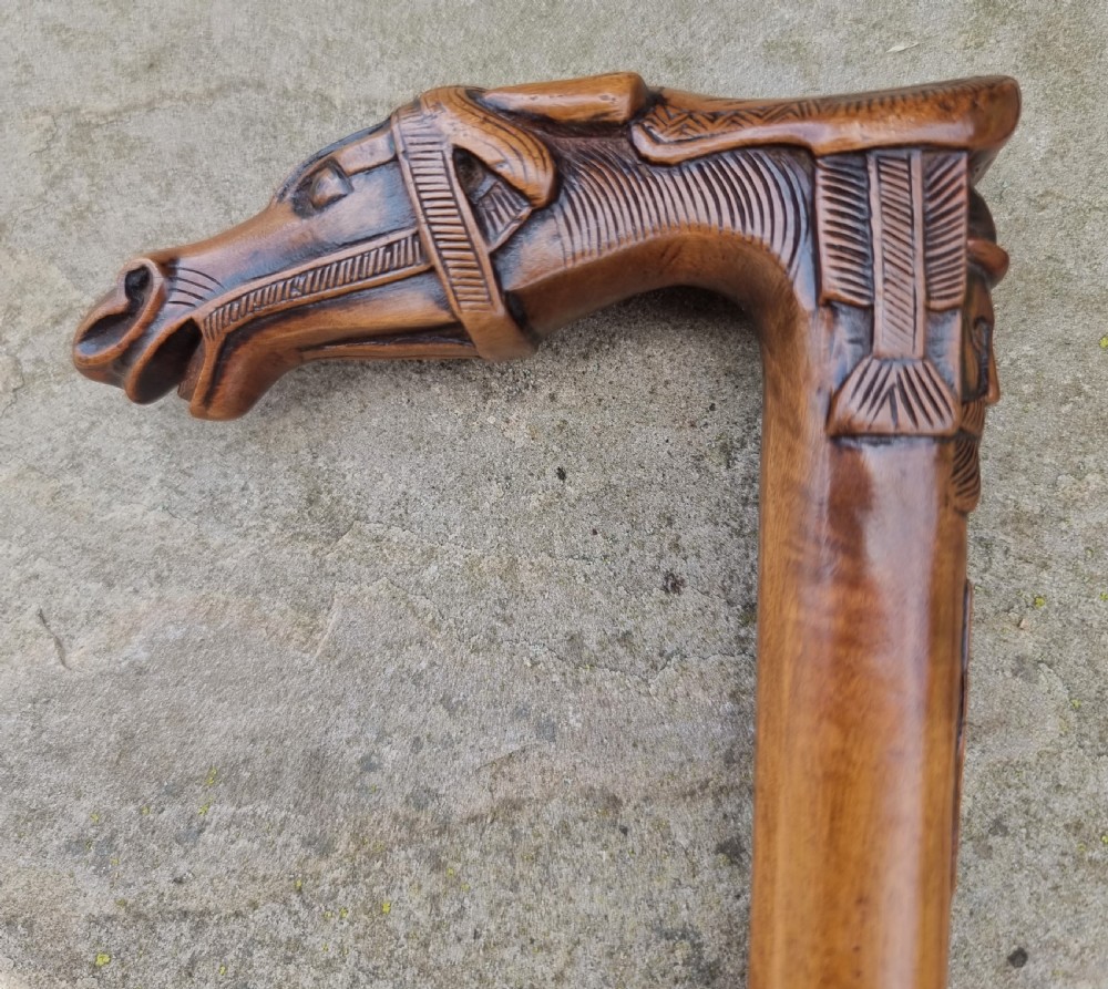 A 19th C antique Grand Tour walking stick with an equestrian racehorse carved handle. View VIII
