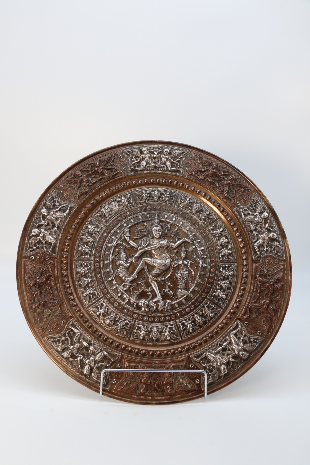A superb Raj period silver, copper and brass repousse work charger. View III