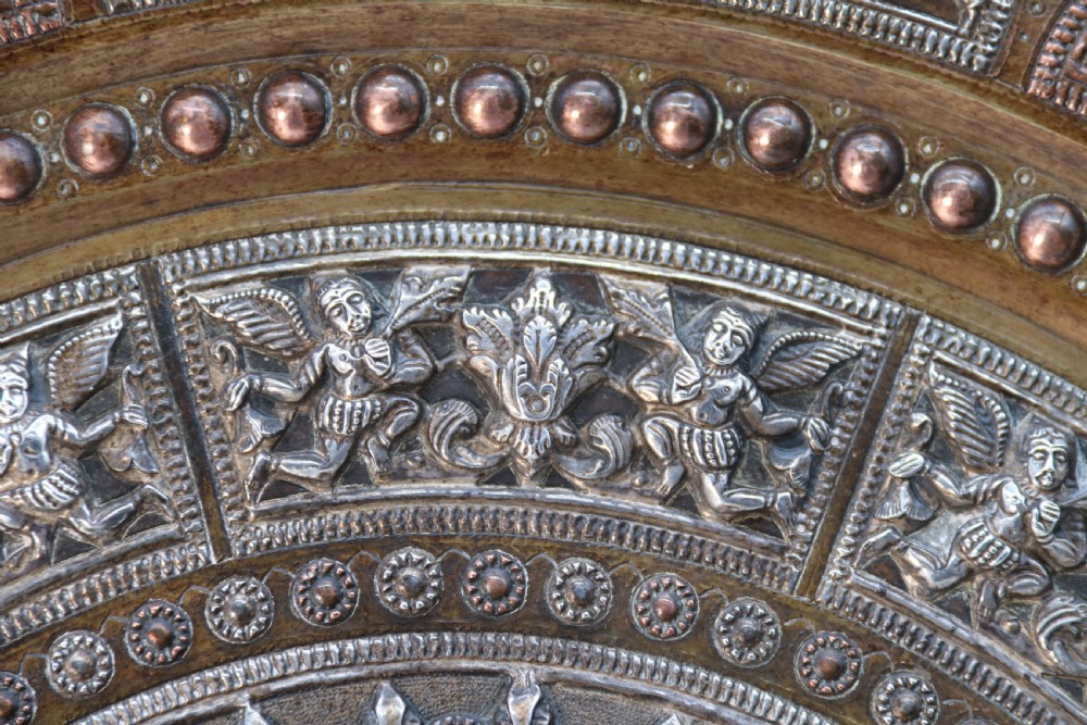 A superb Raj period silver, copper and brass repousse work charger. View VIII