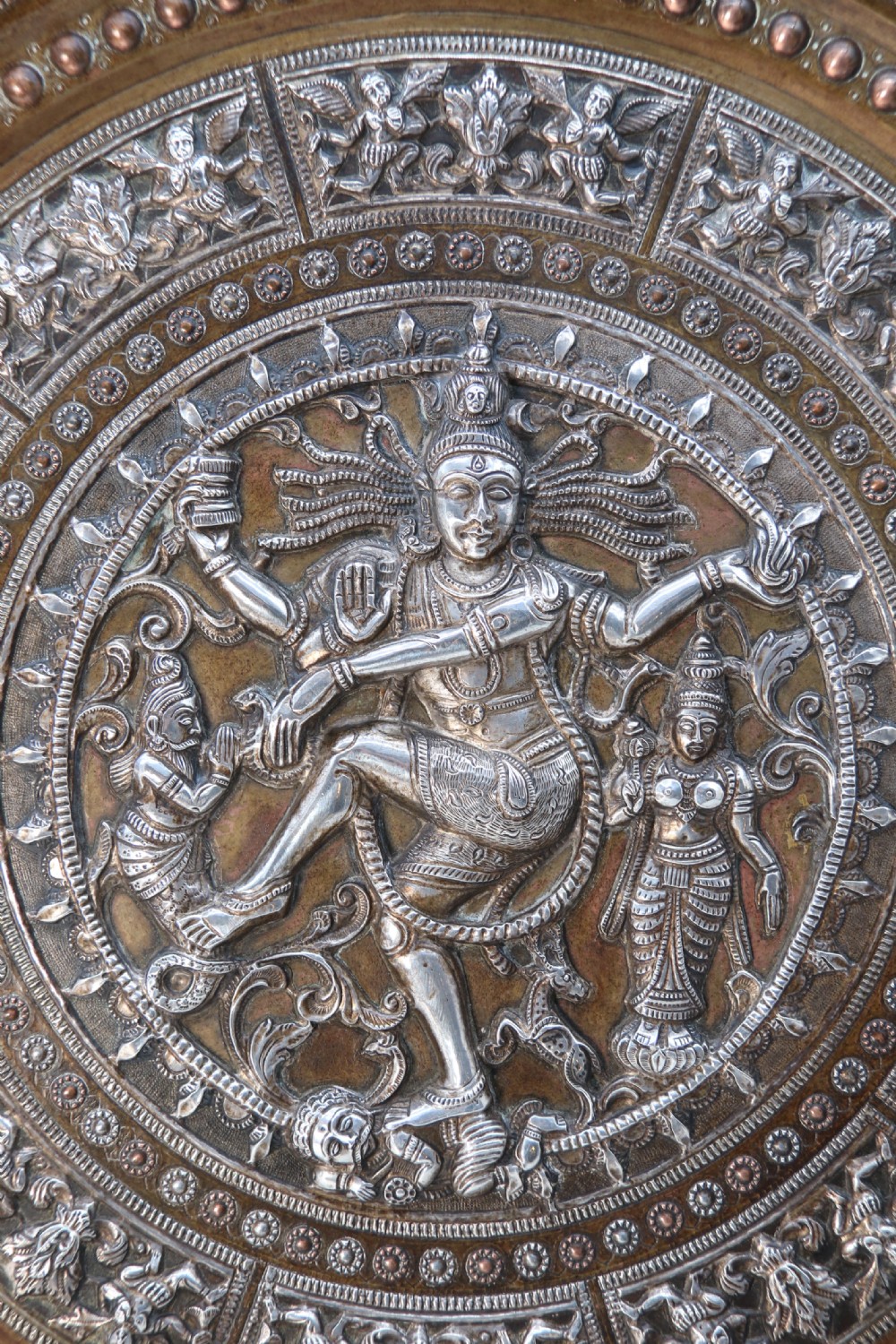 A superb Raj period silver, copper and brass repousse work charger. View X