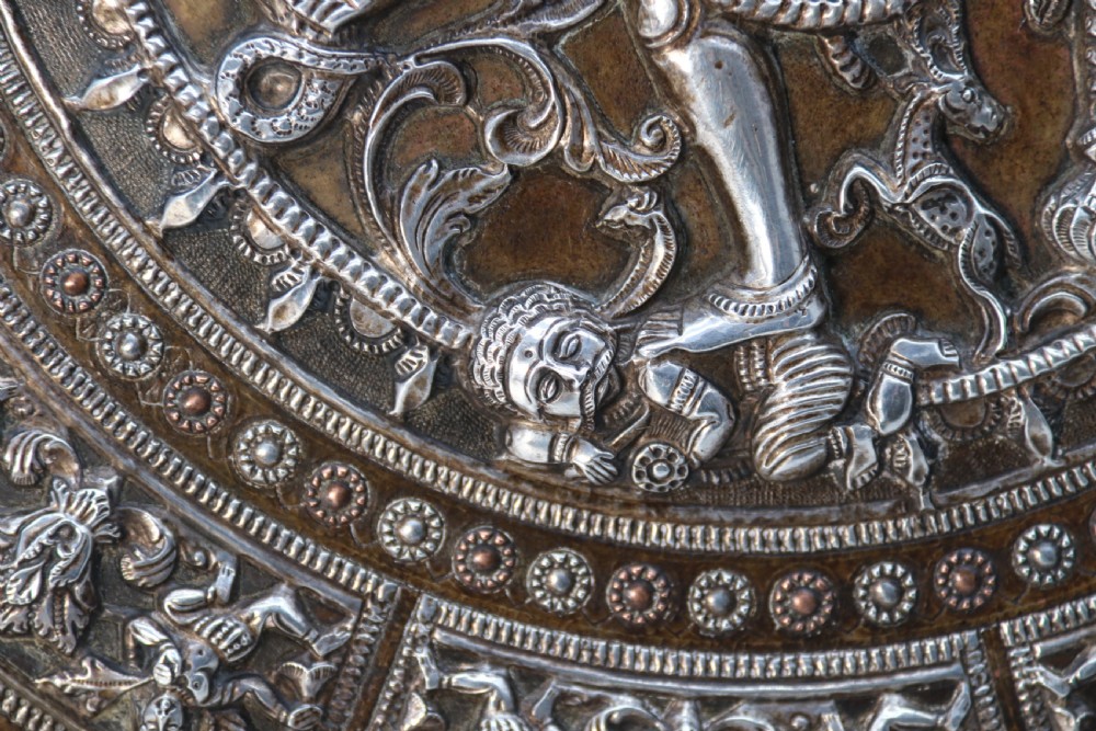 A superb Raj period silver, copper and brass repousse work charger. View XI