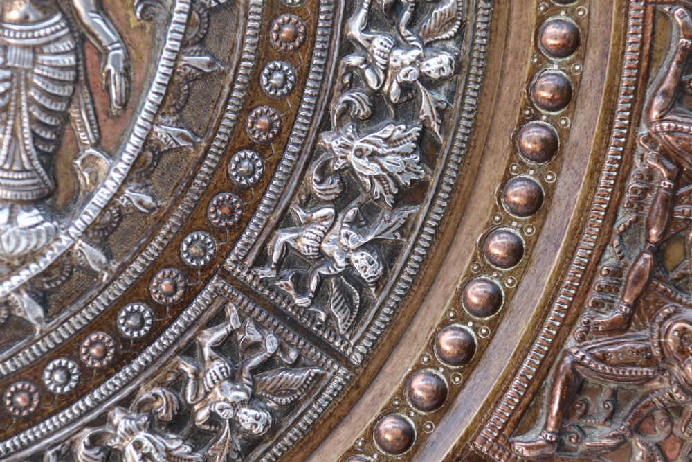 A superb Raj period silver, copper and brass repousse work charger. View XII