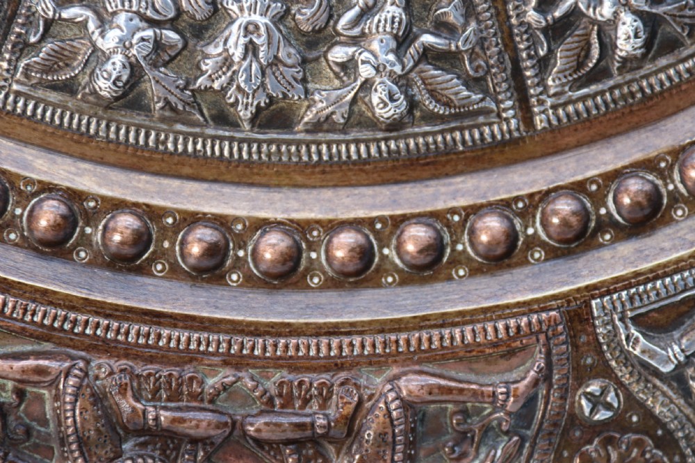 A superb Raj period silver, copper and brass repousse work charger. View XIV