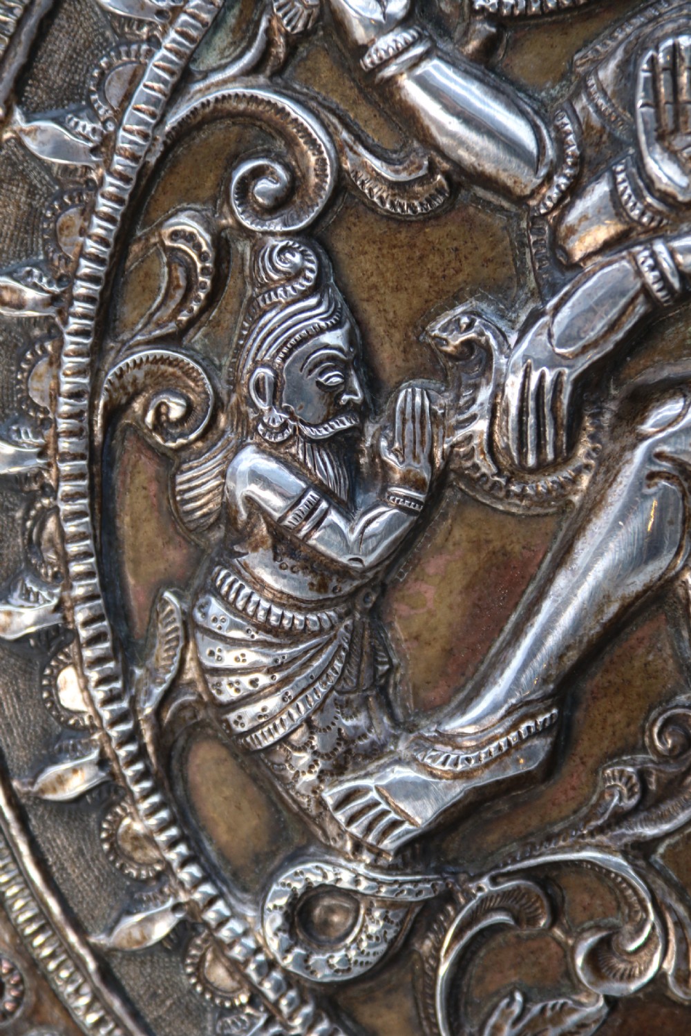 A superb Raj period silver, copper and brass repousse work charger. View XV