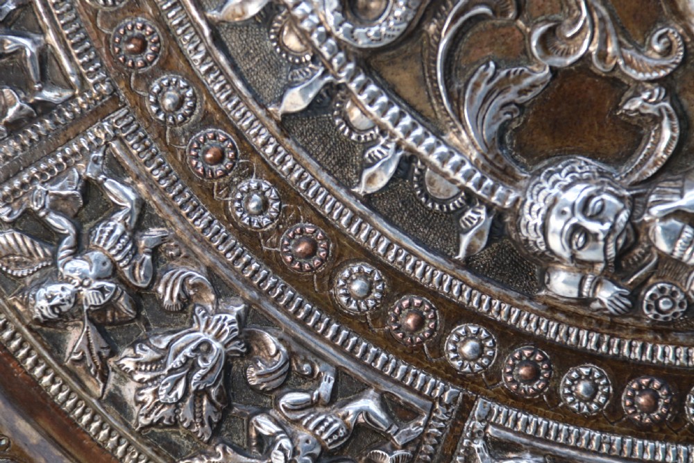 A superb Raj period silver, copper and brass repousse work charger. View XVII