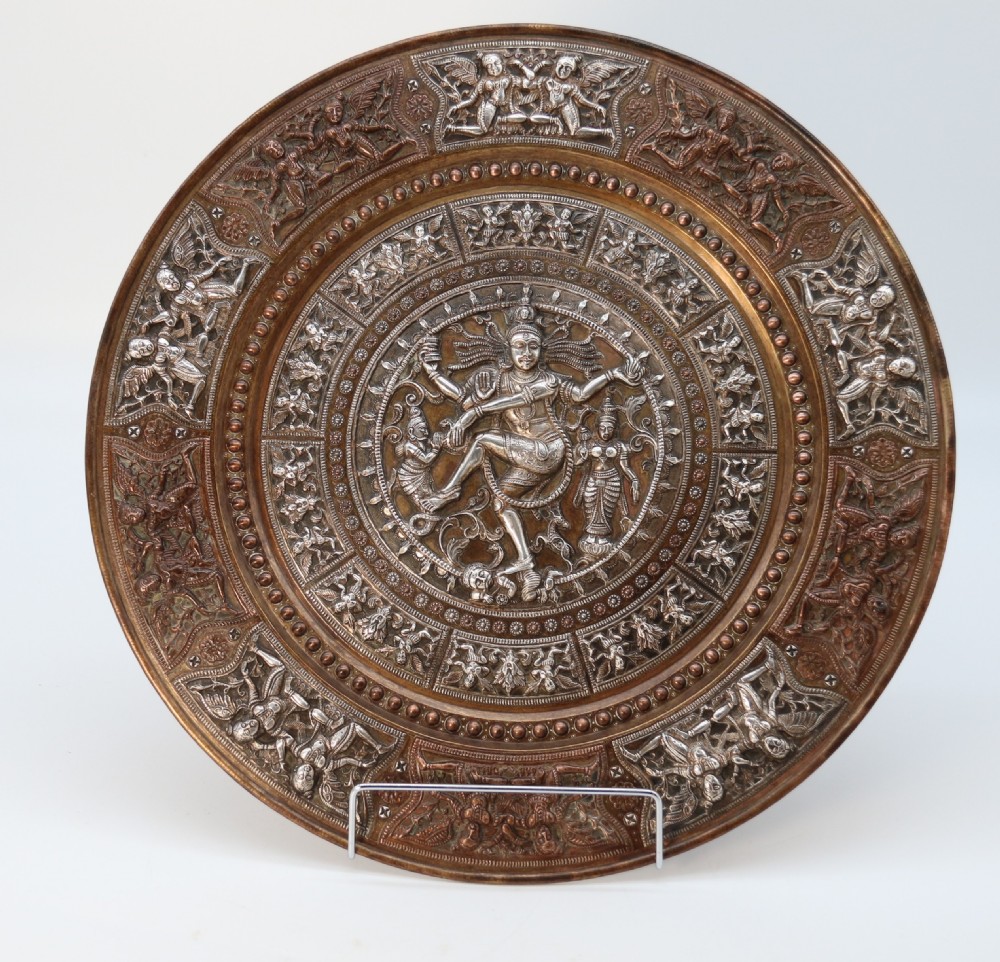 A superb Raj period silver, copper and brass repousse work charger.