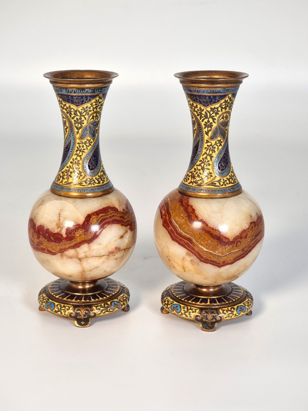 A pair of French champlevé enamel ormolu and onyx vases circa 1880 View V