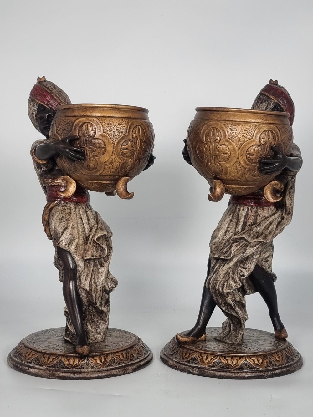 A cast and cold painted pair of Blackamoor figure jardinieres  View II