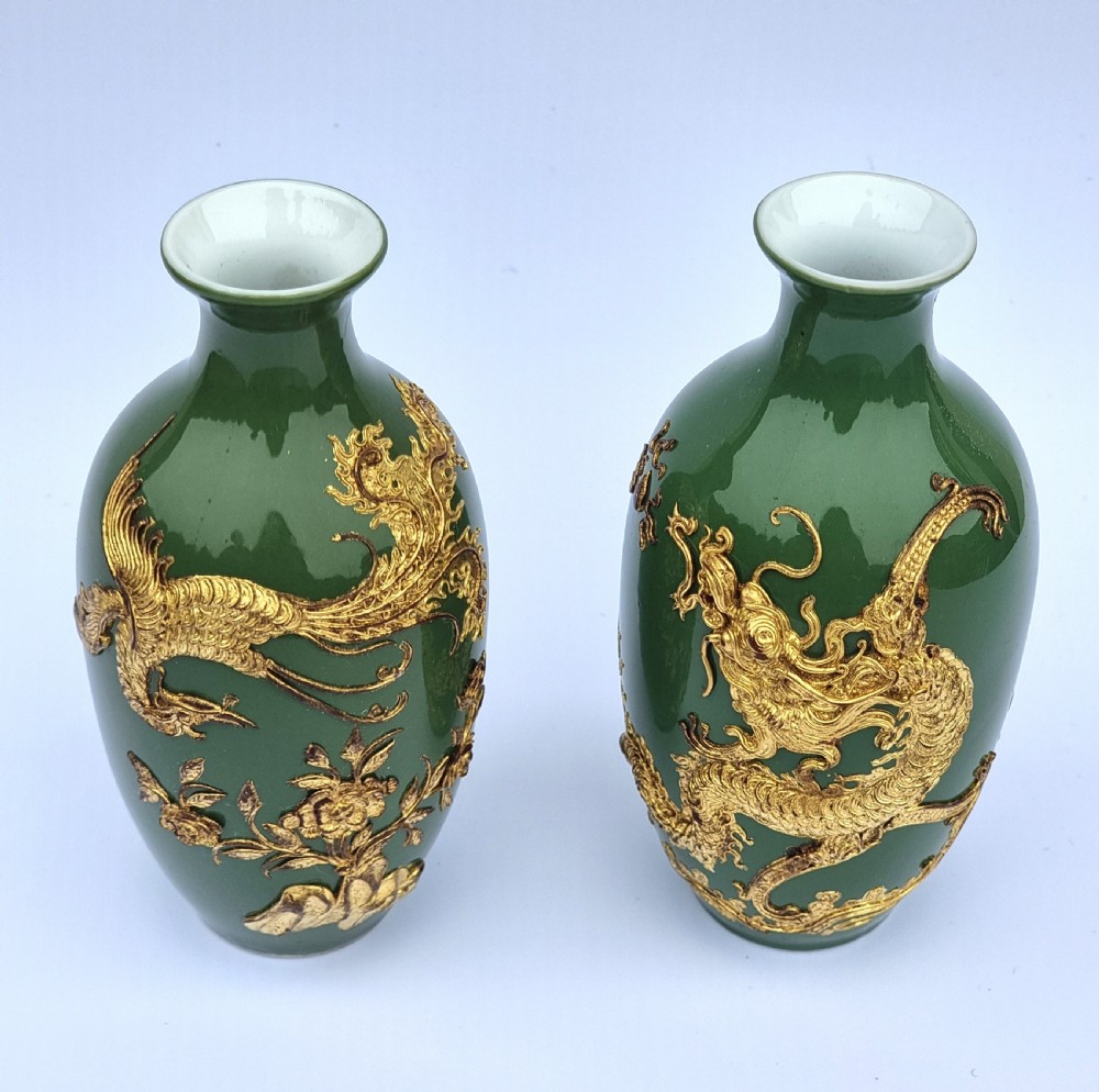 A miniature pair of Chinese porcelain and lacquer decorated vases View II