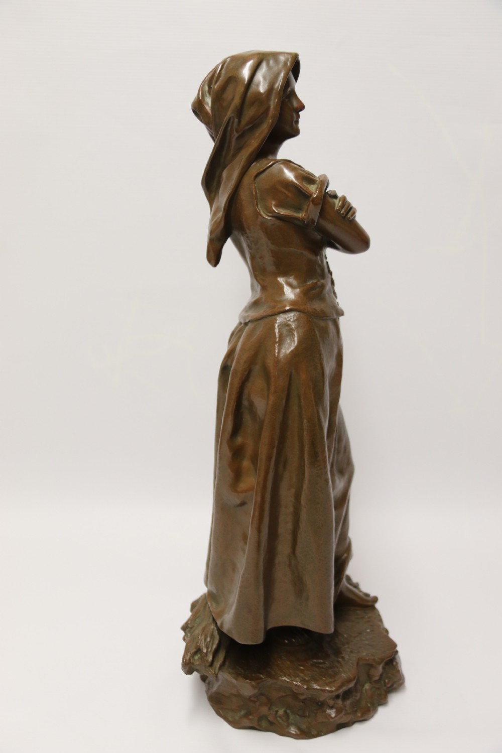 A 19th century  French bronze sculpture of a young female gathering hey at harvest View VIII