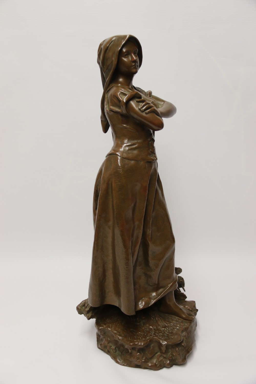 A 19th century  French bronze sculpture of a young female gathering hey at harvest View IX