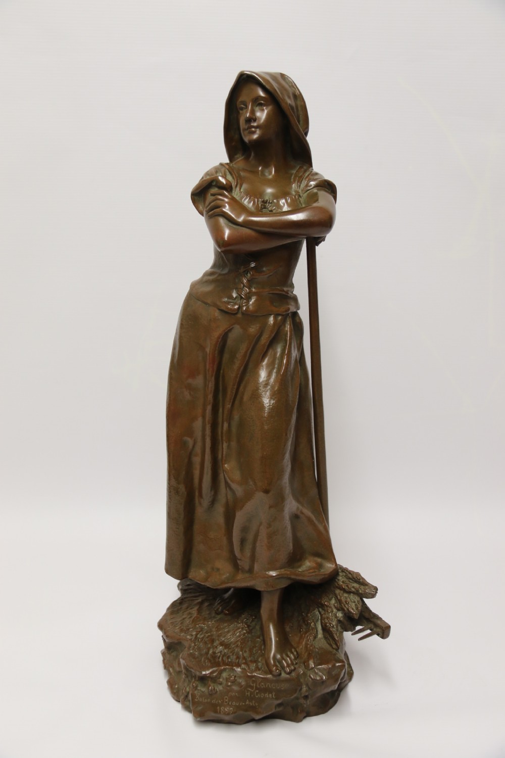 A 19th century  French bronze sculpture of a young female gathering hey at harvest View X