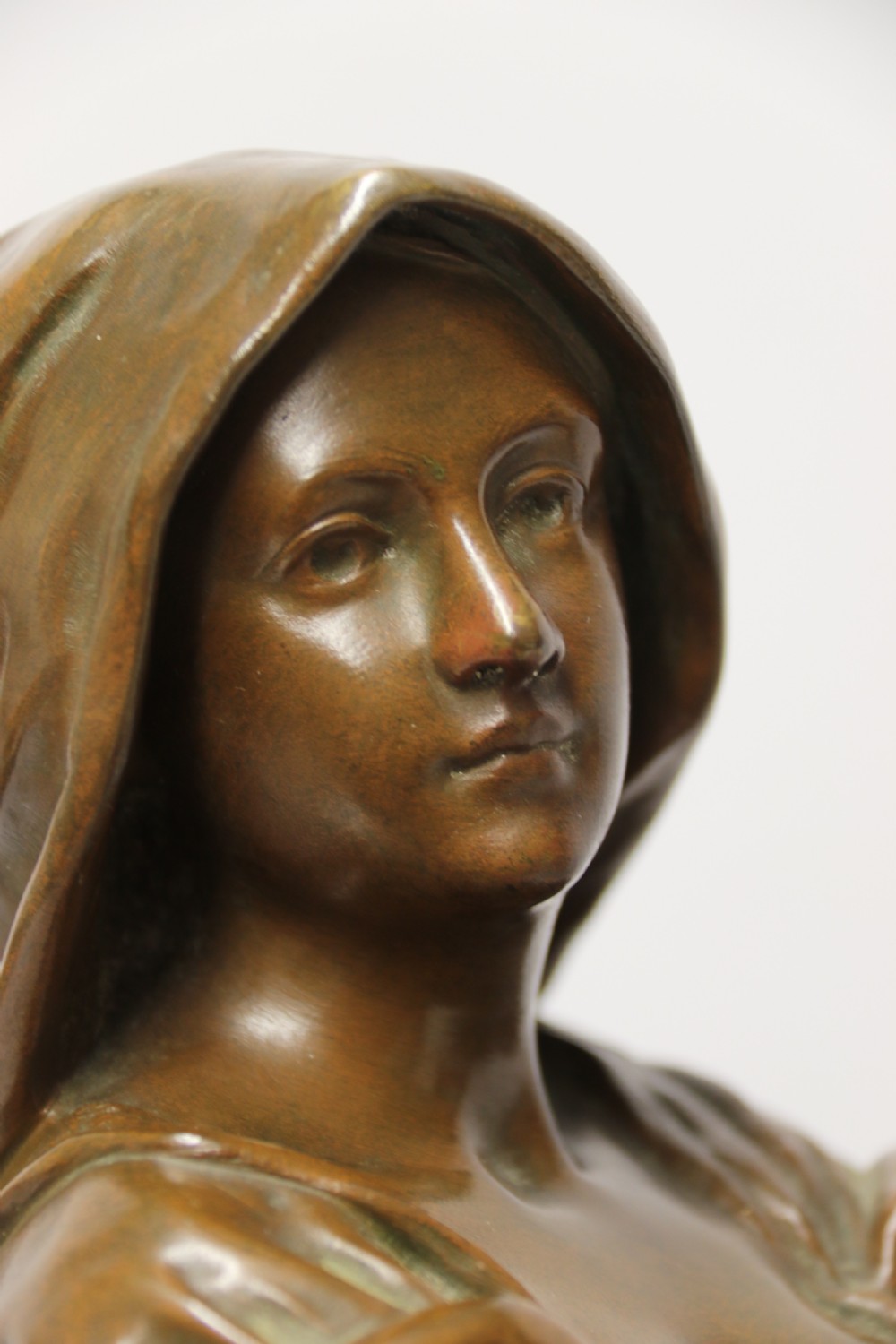 A 19th century  French bronze sculpture of a young female gathering hey at harvest View XI