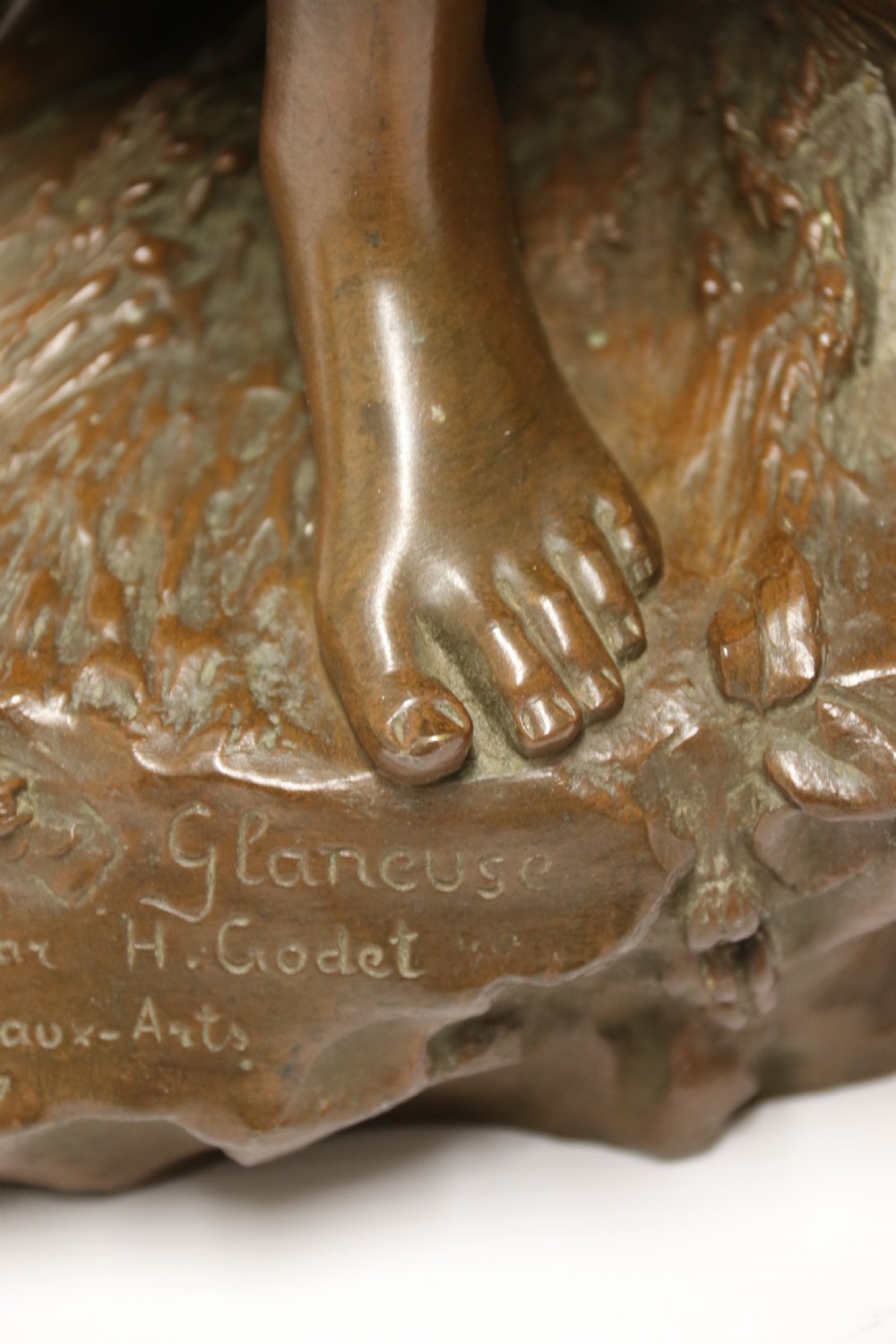 A 19th century  French bronze sculpture of a young female gathering hey at harvest View XII