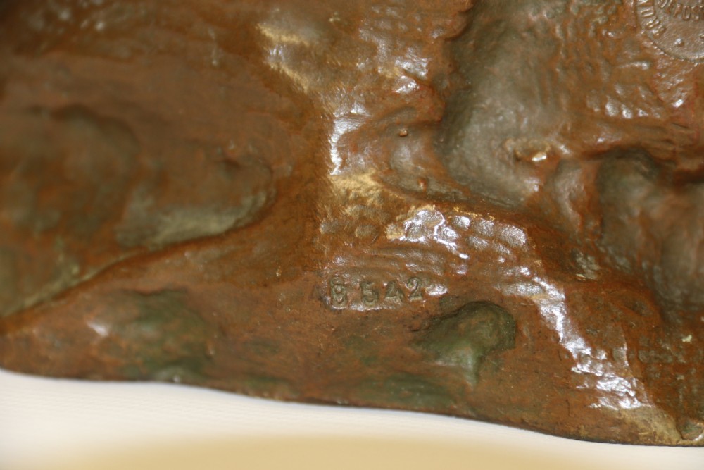 A 19th century  French bronze sculpture of a young female gathering hey at harvest View XV