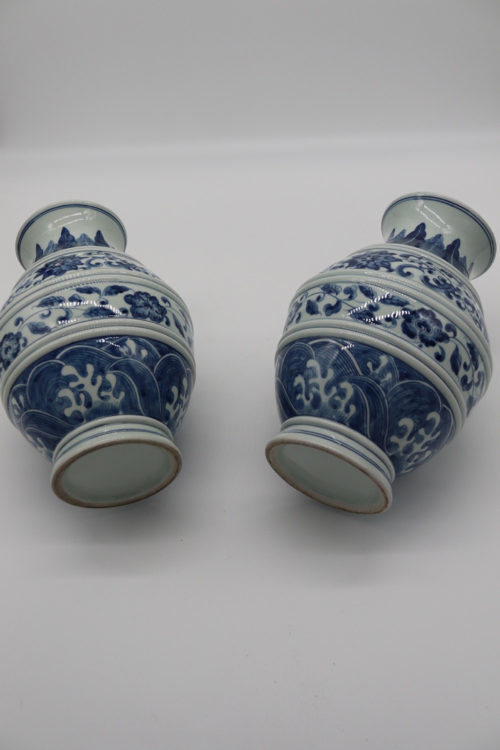 A pair of Chinese hand painted blue and white porcelain vases View XIV