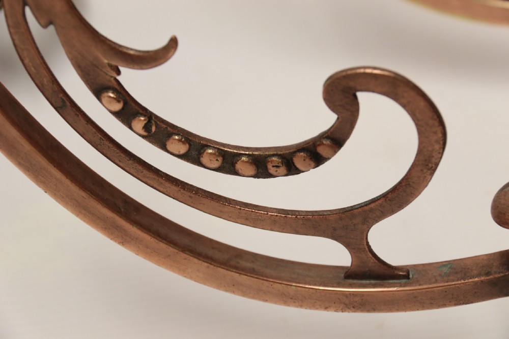 A stylish set of four early 20th century copper arts and crafts gas wall lights View III