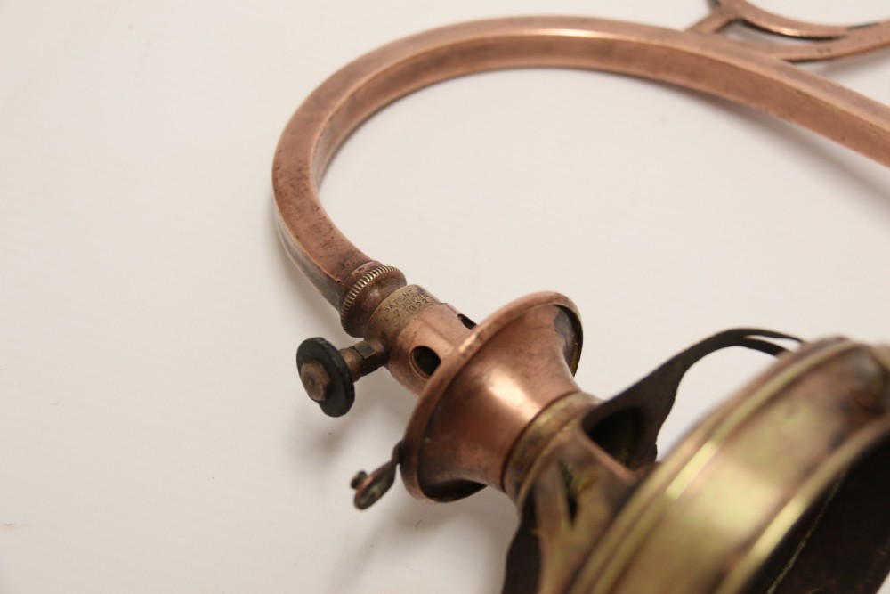 A stylish set of four early 20th century copper arts and crafts gas wall lights View VIII