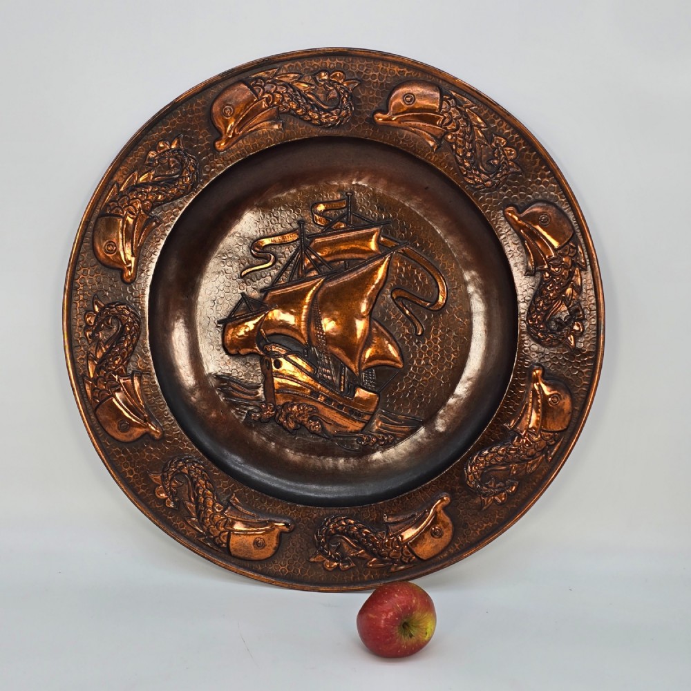 A Cornish copper Arts and Crafts charger by J. F Poole of Hayle, Cornwall, England