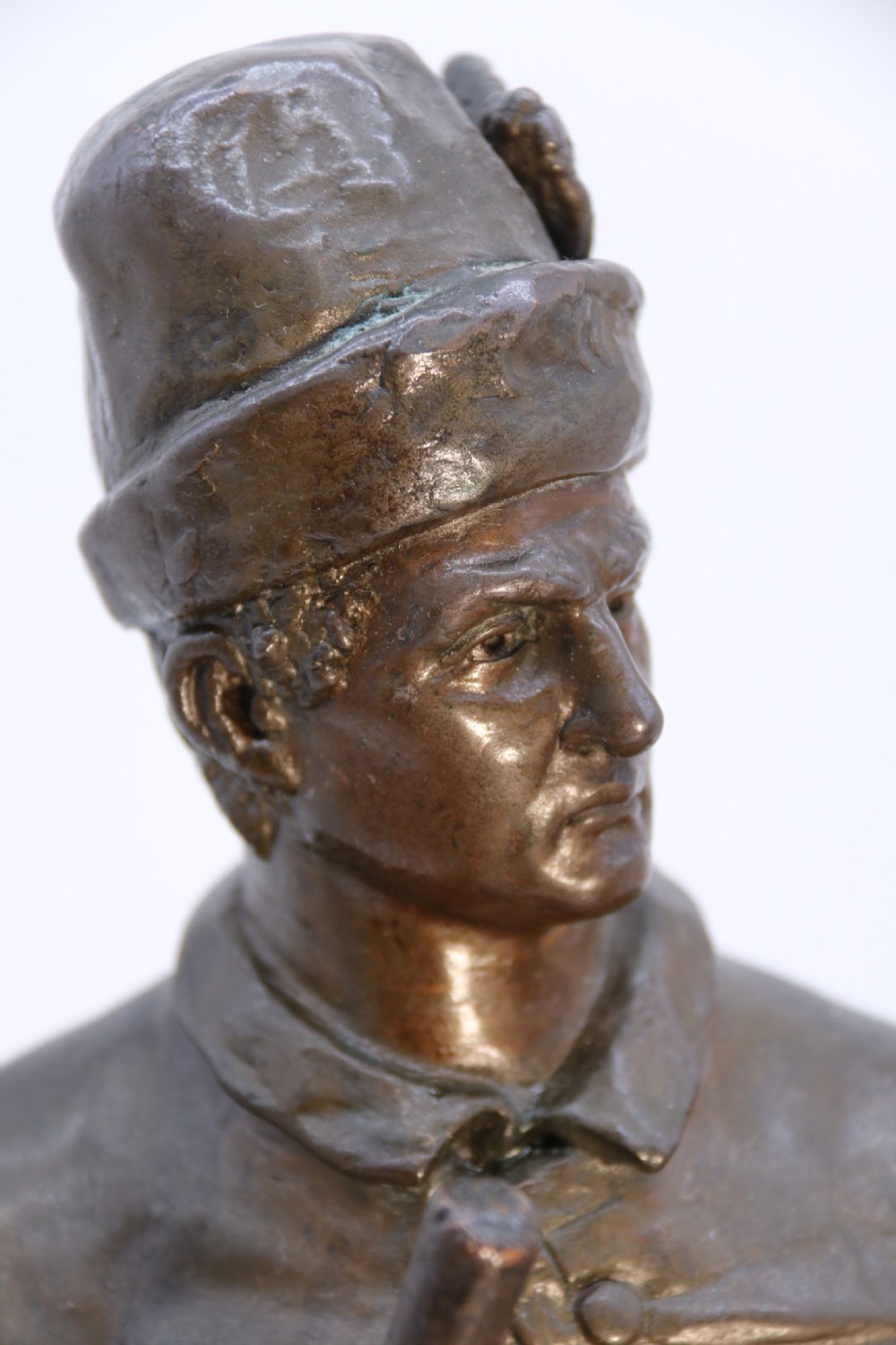 A pair of patinated electrotype bronze figures depicting historic tradesmen standing on rectangular plinths. View XVII