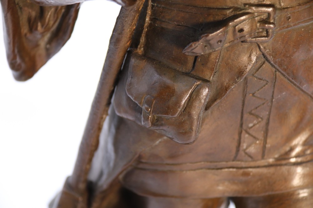 A pair of patinated electrotype bronze figures depicting historic tradesmen standing on rectangular plinths. View XVIII