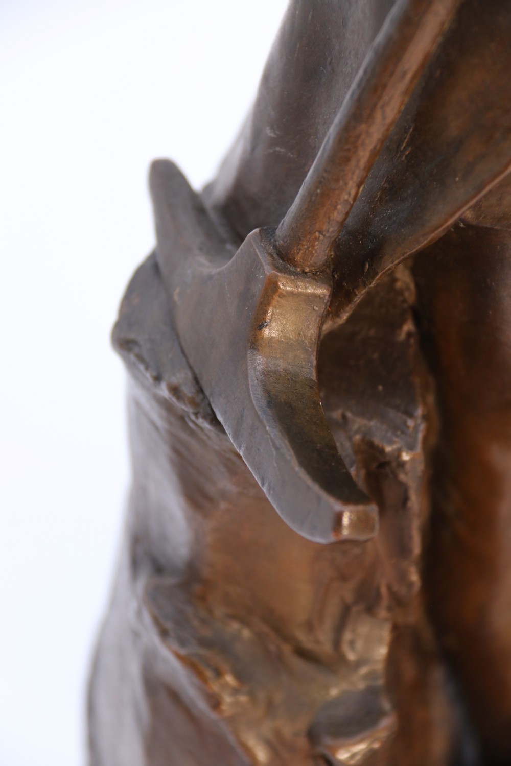 A pair of patinated electrotype bronze figures depicting historic tradesmen standing on rectangular plinths. View XXII