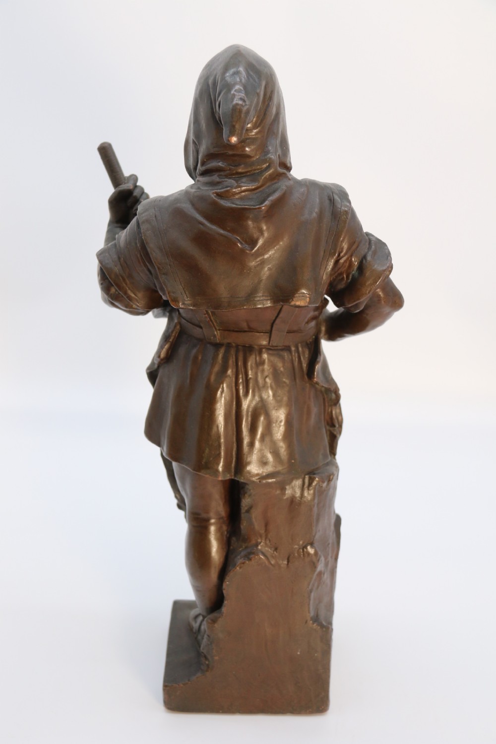 A pair of patinated electrotype bronze figures depicting historic tradesmen standing on rectangular plinths. View XXVII