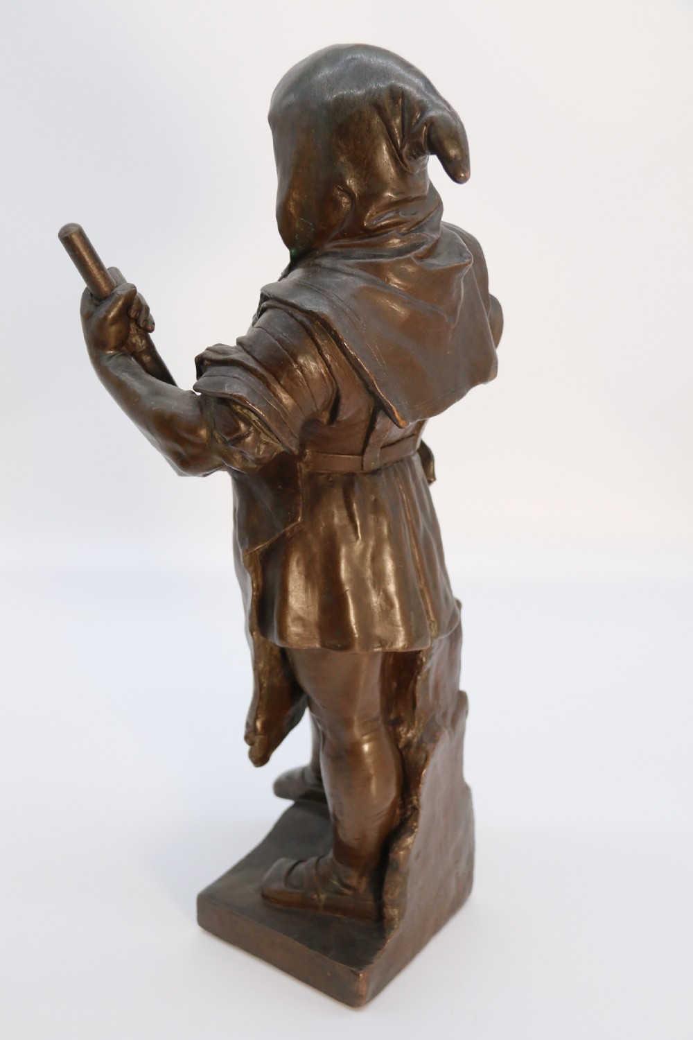 A pair of patinated electrotype bronze figures depicting historic tradesmen standing on rectangular plinths. View XXVIII
