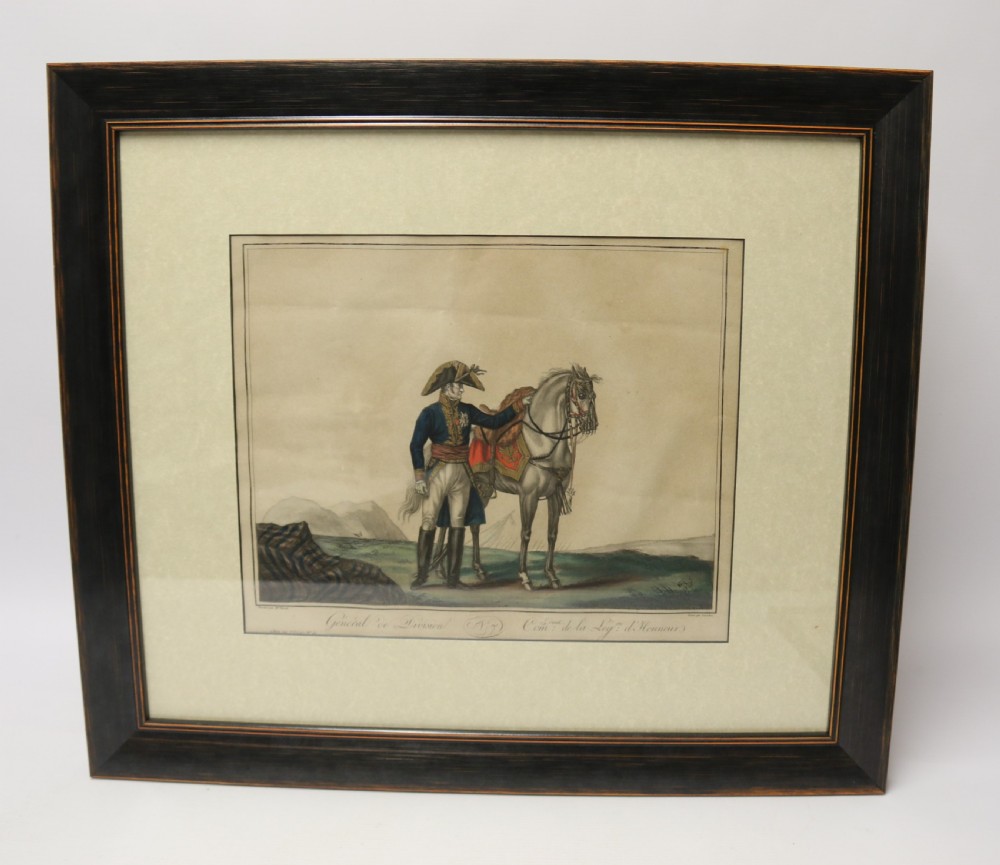 A framed early nineteenth-century hand-coloured print depicting a French Napoleonic military officer standing beside a grey horse in a landscape.